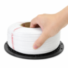 eSpool – installation du refill sur fond blanc Installation du refill blanc dans la bobine eSUN eSpool+ 2.0 sur fond blanc
